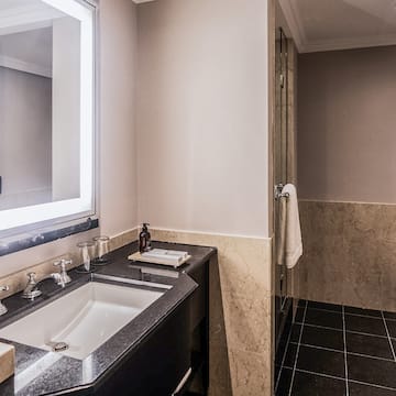 a bathroom with a mirror and sink