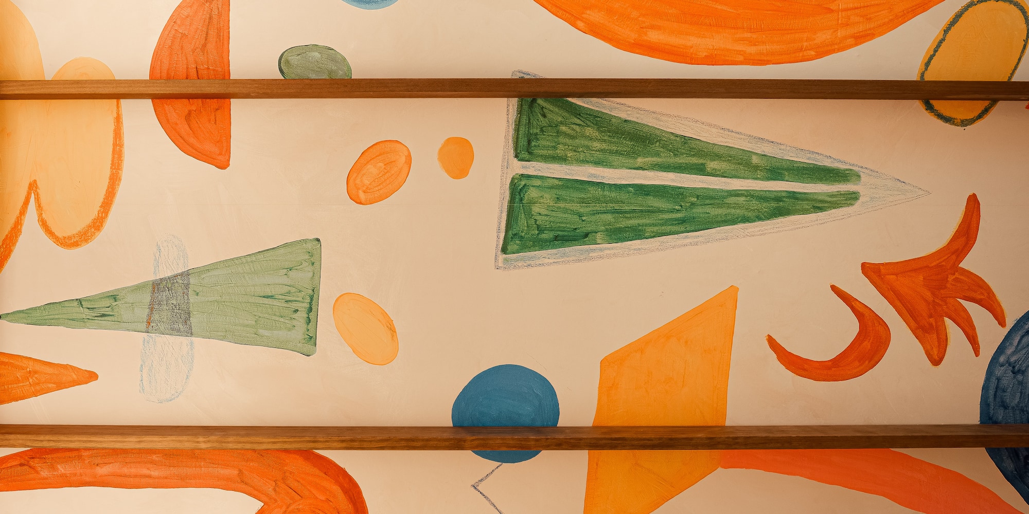 a wall with colorful drawings on it