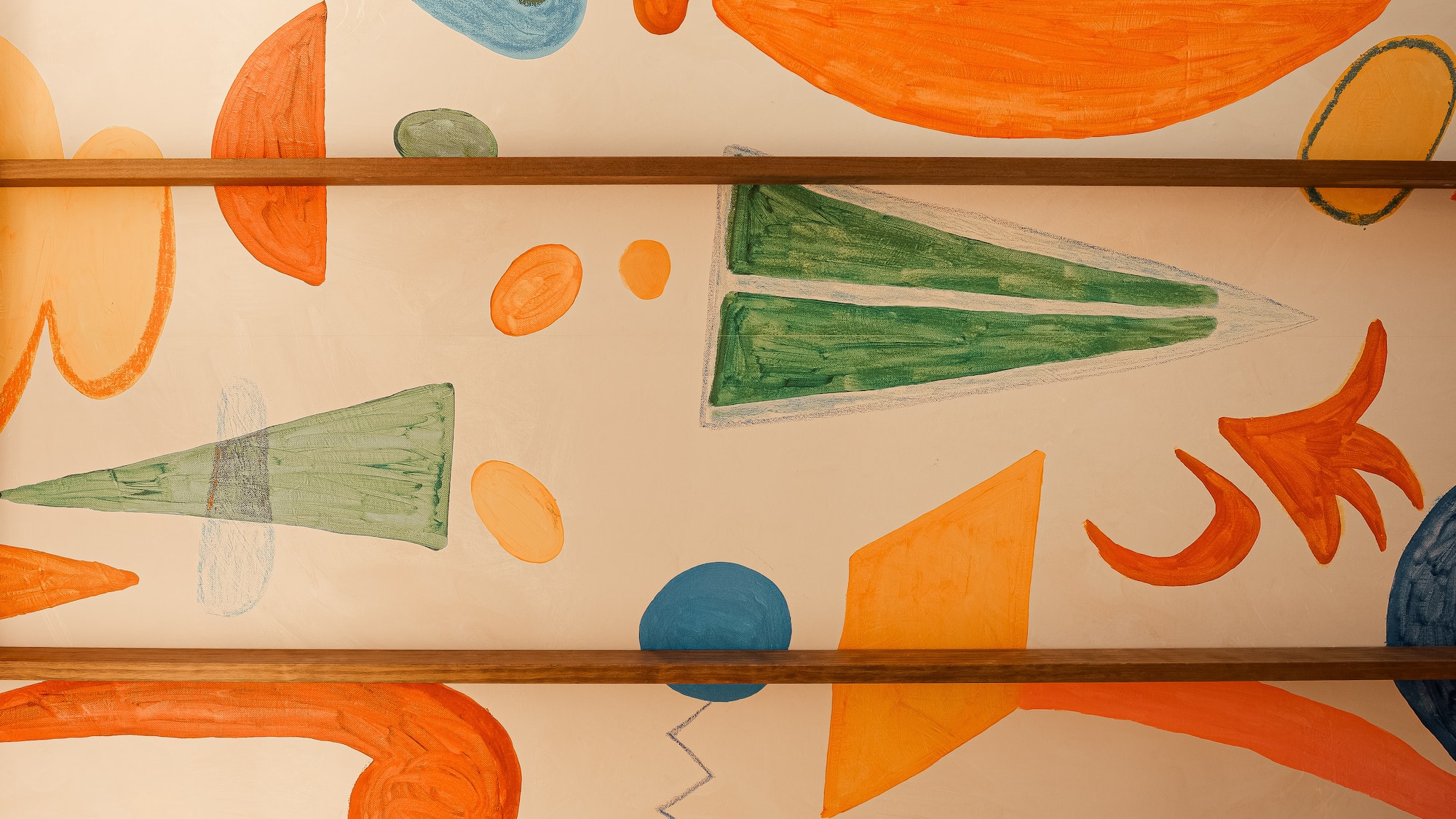 a wall with colorful drawings on it