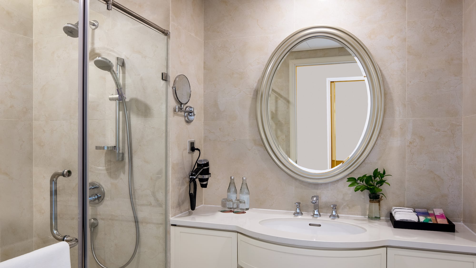 a bathroom with a mirror and sink