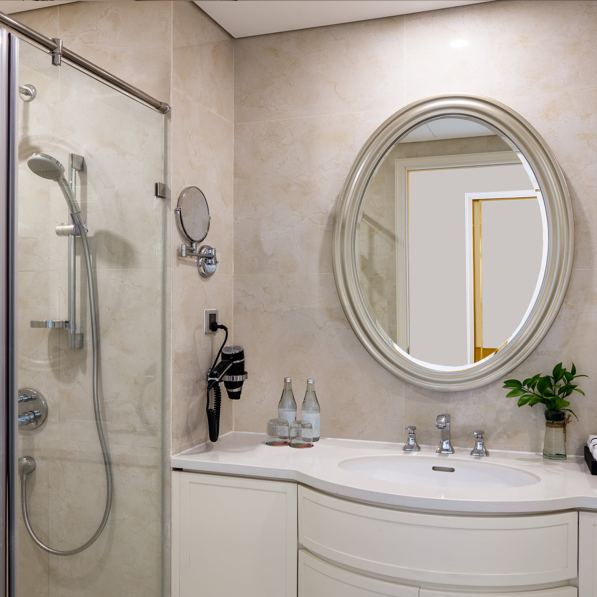 a bathroom with a mirror and sink