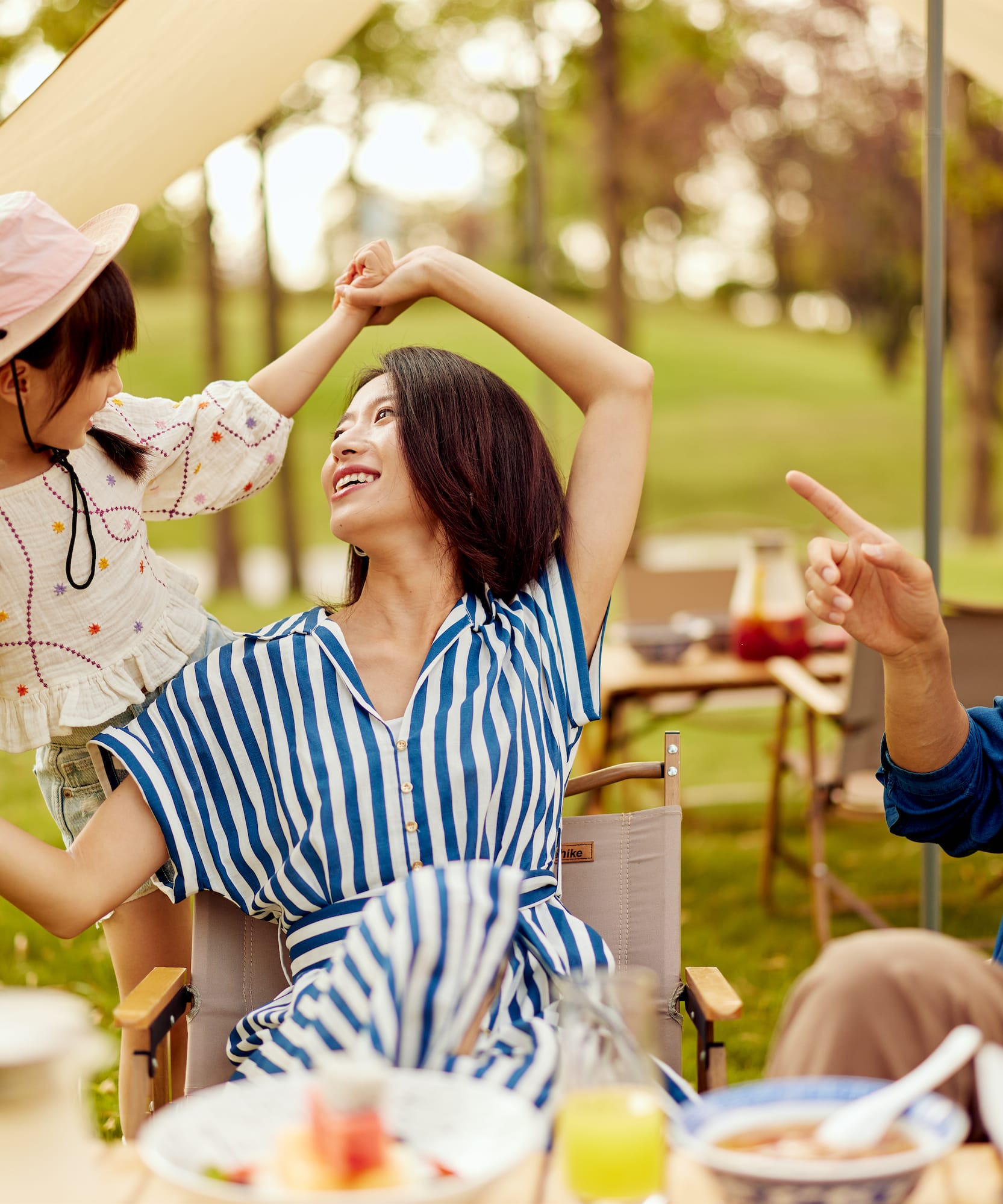 a woman and a child dancing