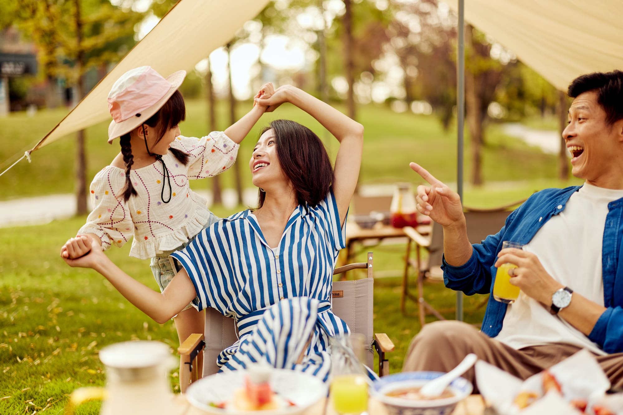 a woman and a child dancing