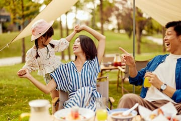 a woman and a child dancing