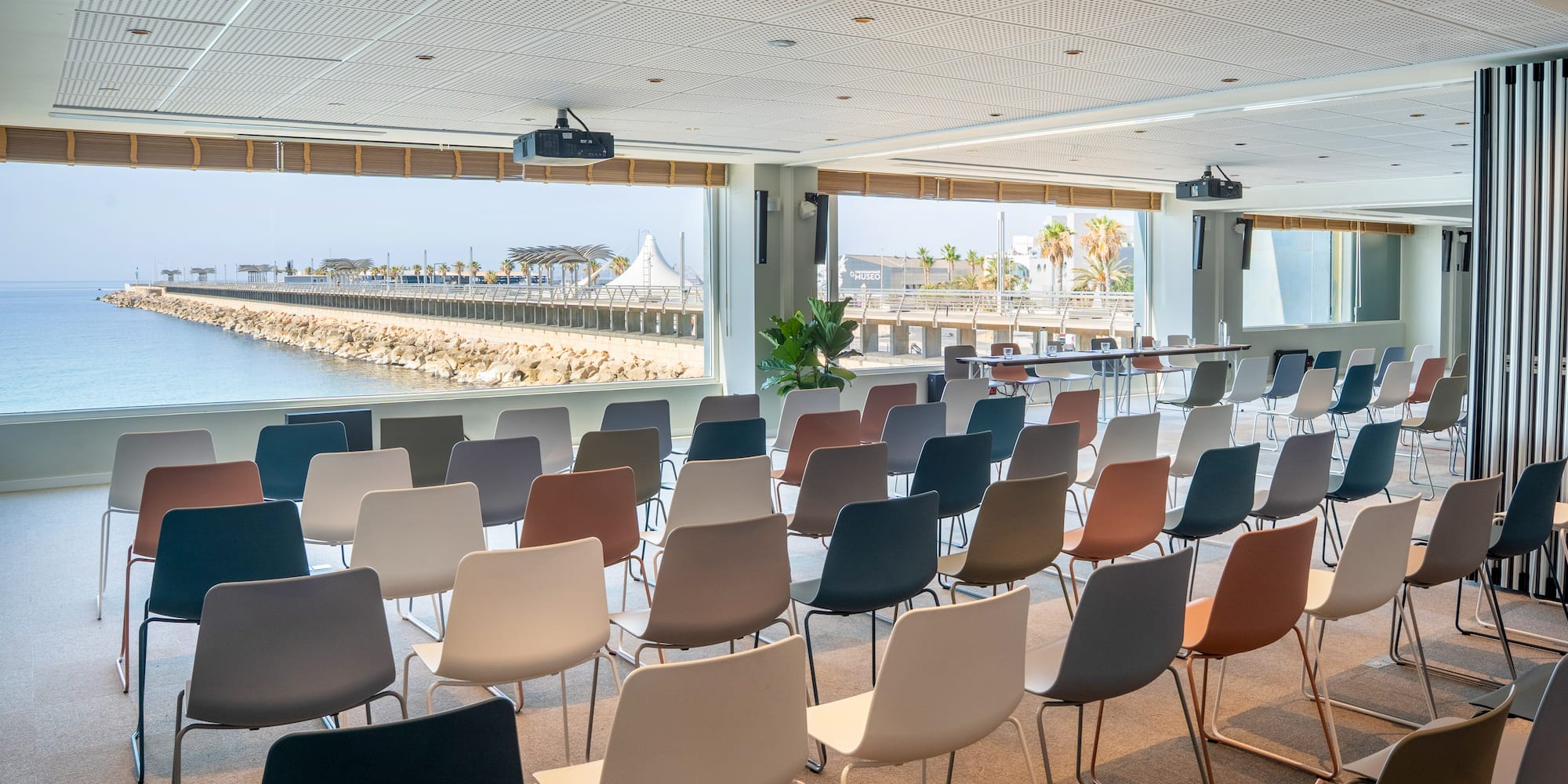 a room with rows of chairs