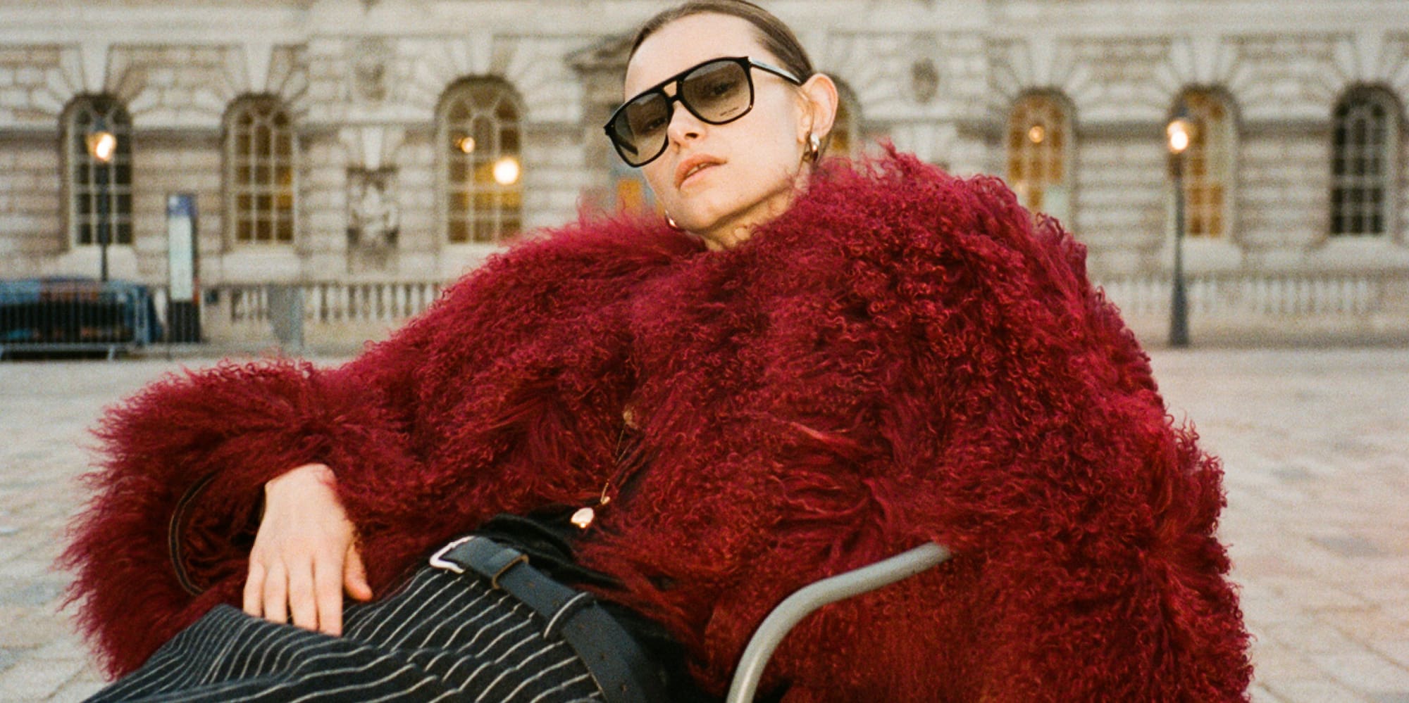 a woman sitting on a chair