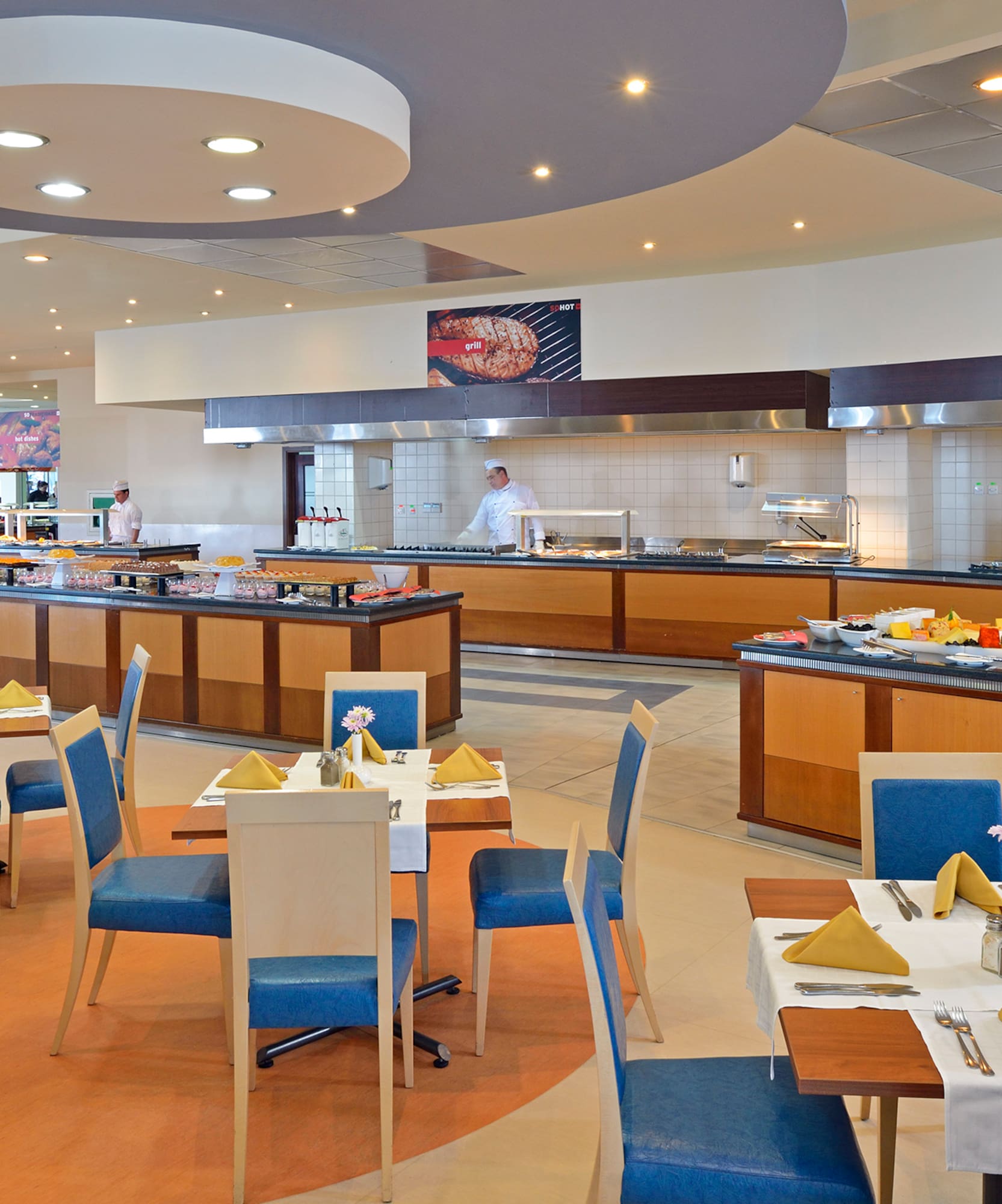 a restaurant with many tables and chairs