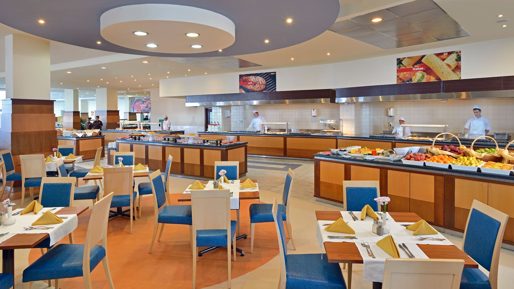 a restaurant with many tables and chairs