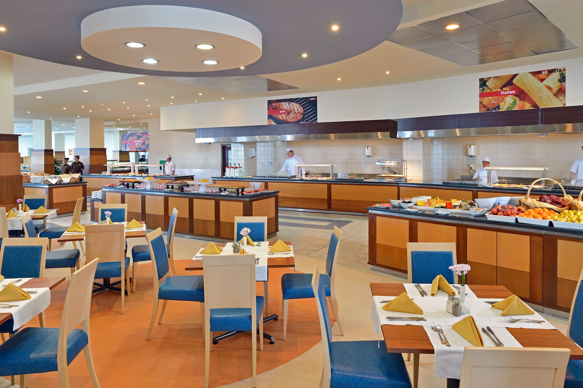 a restaurant with many tables and chairs