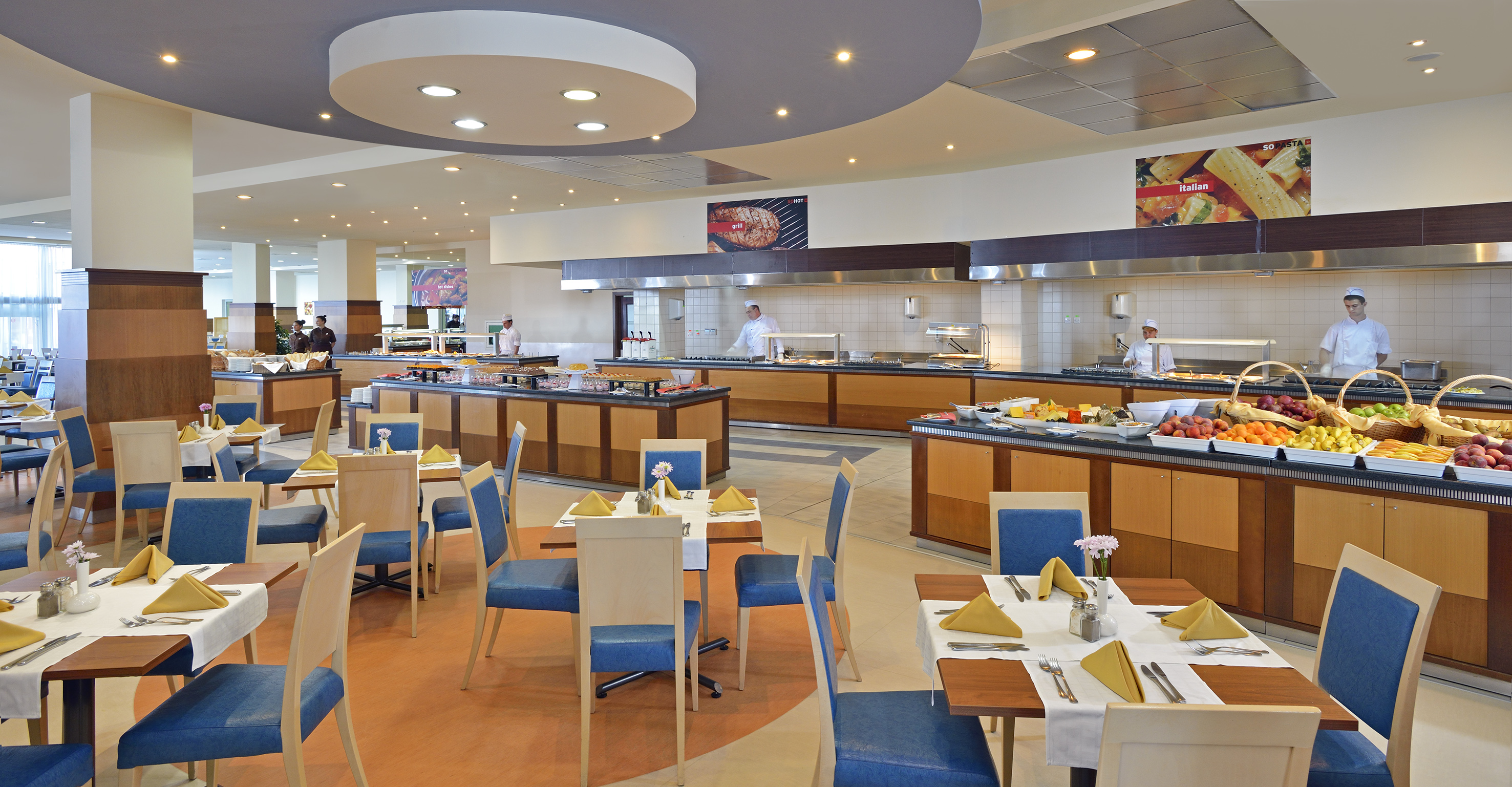 a restaurant with many tables and chairs