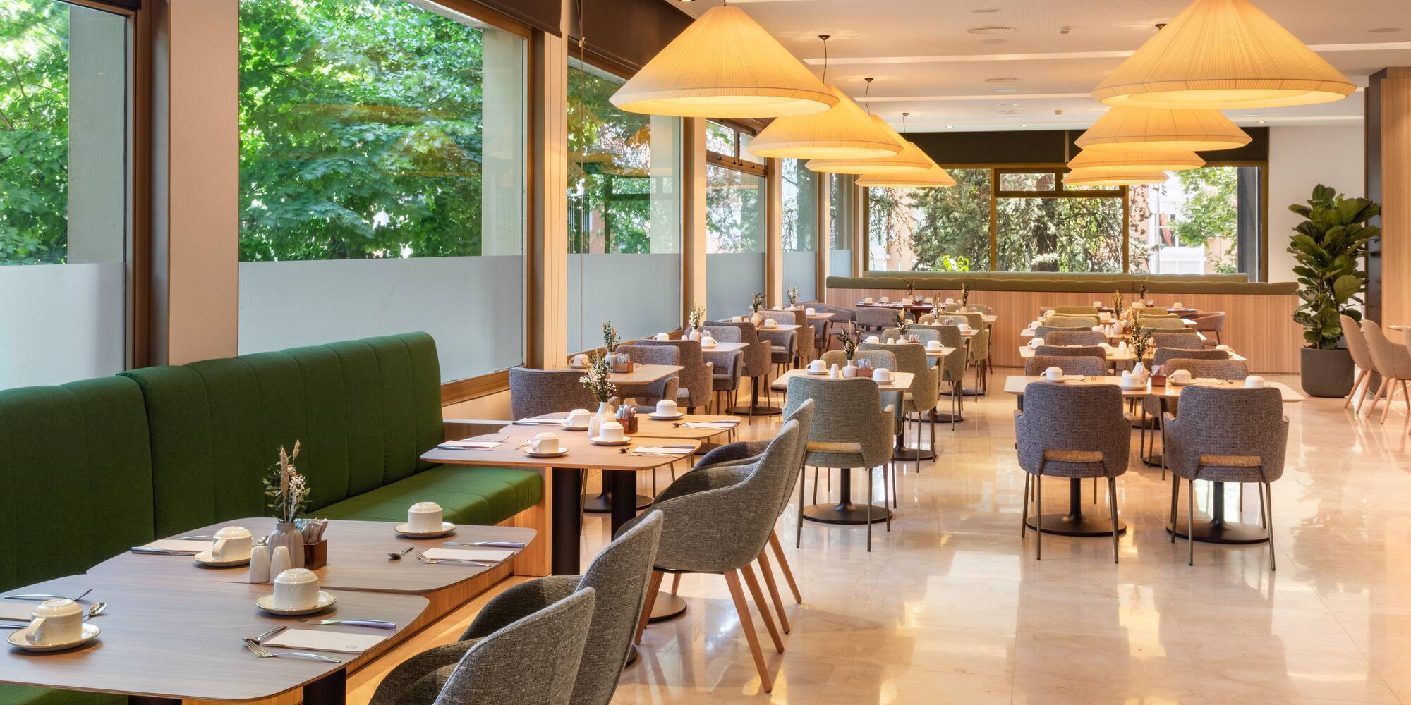 a restaurant with tables and chairs