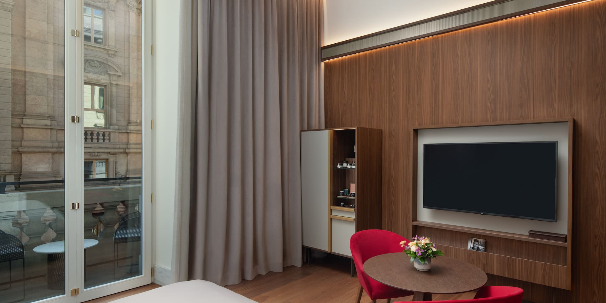 a room with a tv and a table