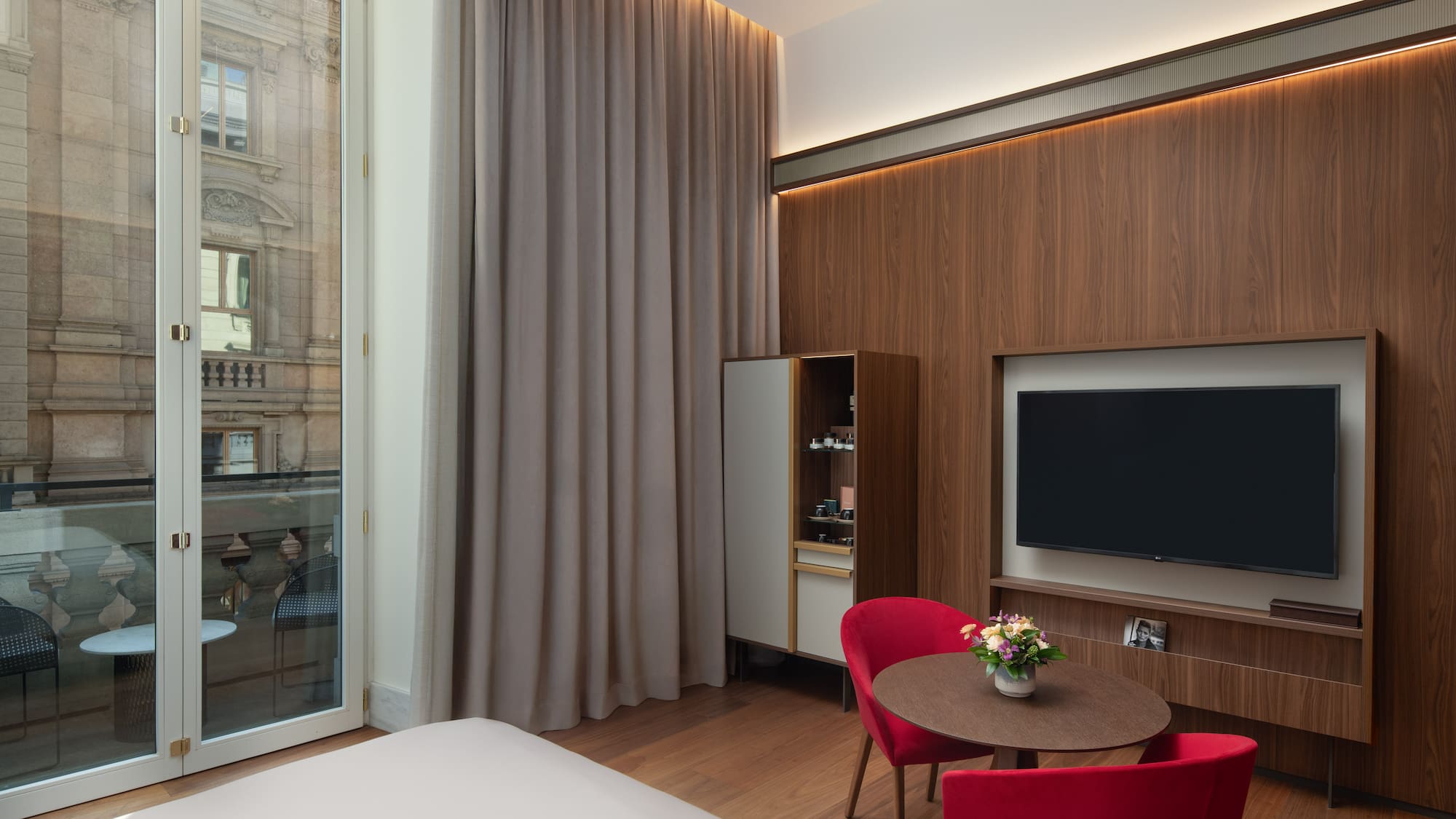 a room with a tv and a table