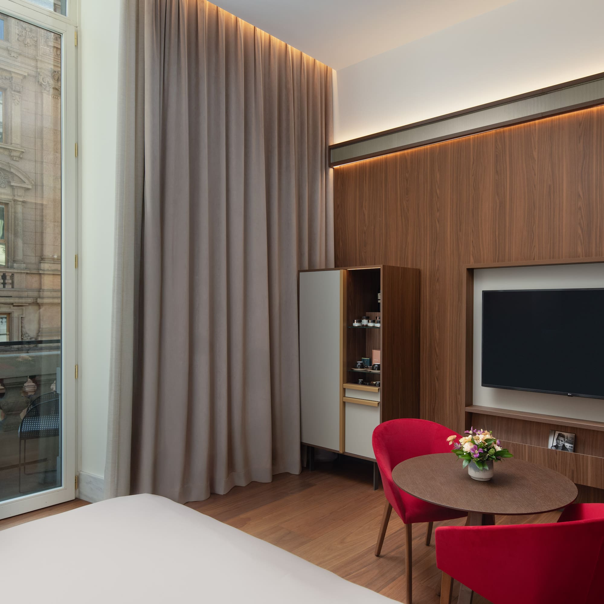 a room with a tv and a table