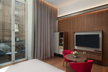 a room with a tv and a table