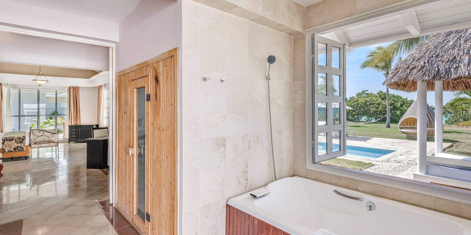 a bathroom with a tub and a window