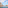 Hotel resort with large swimming pool, sun loungers, beach, and sea view.