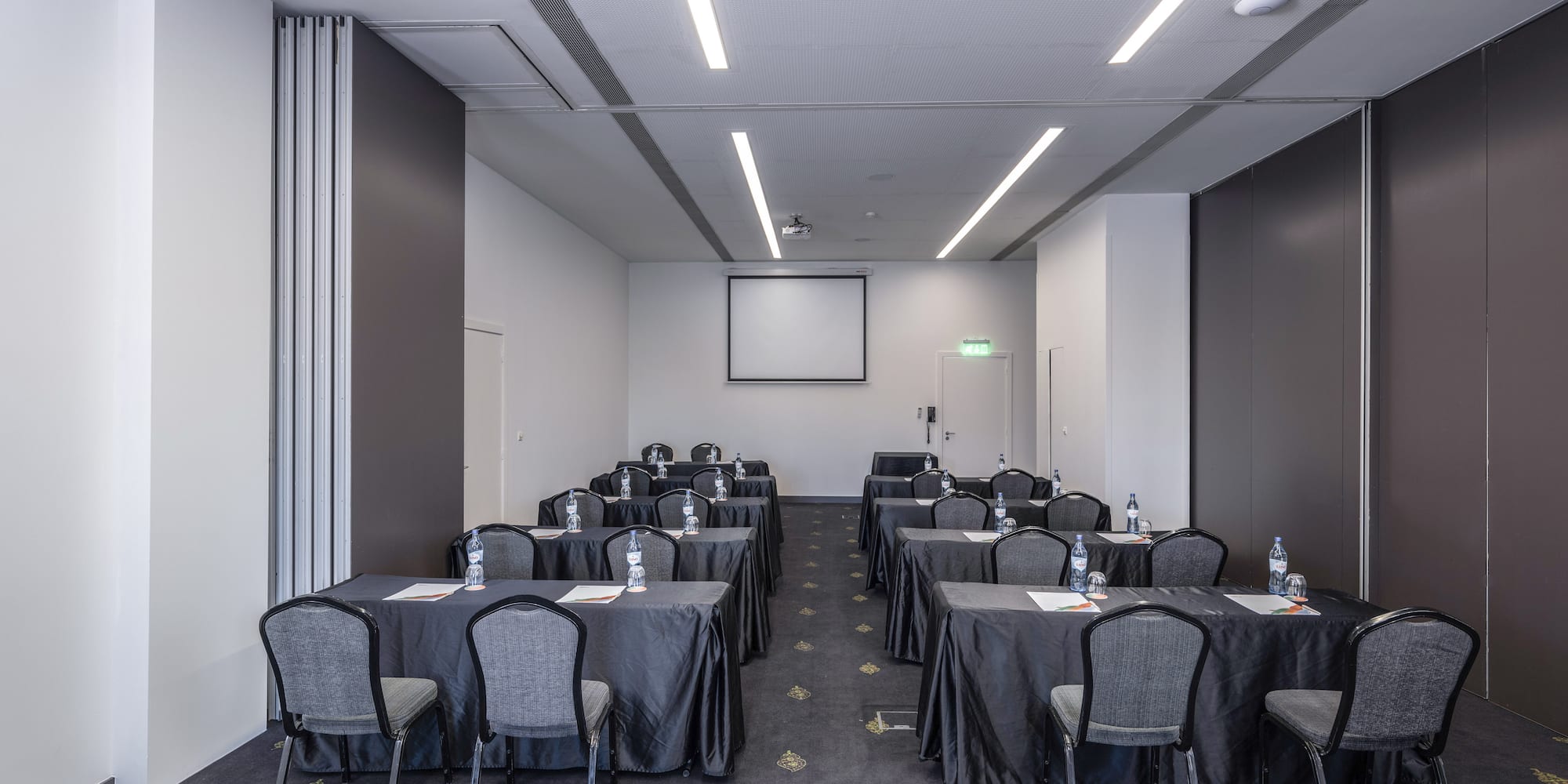 a room with tables and chairs