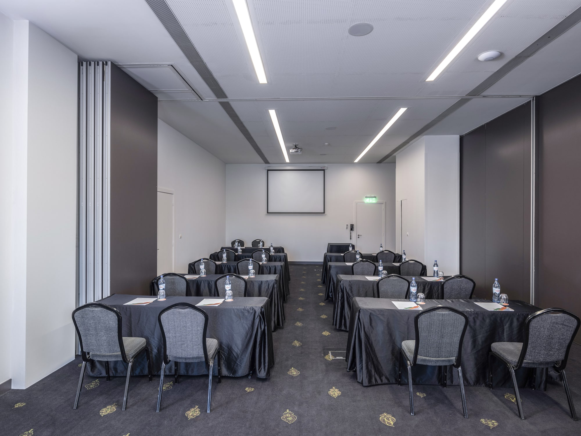 a room with tables and chairs