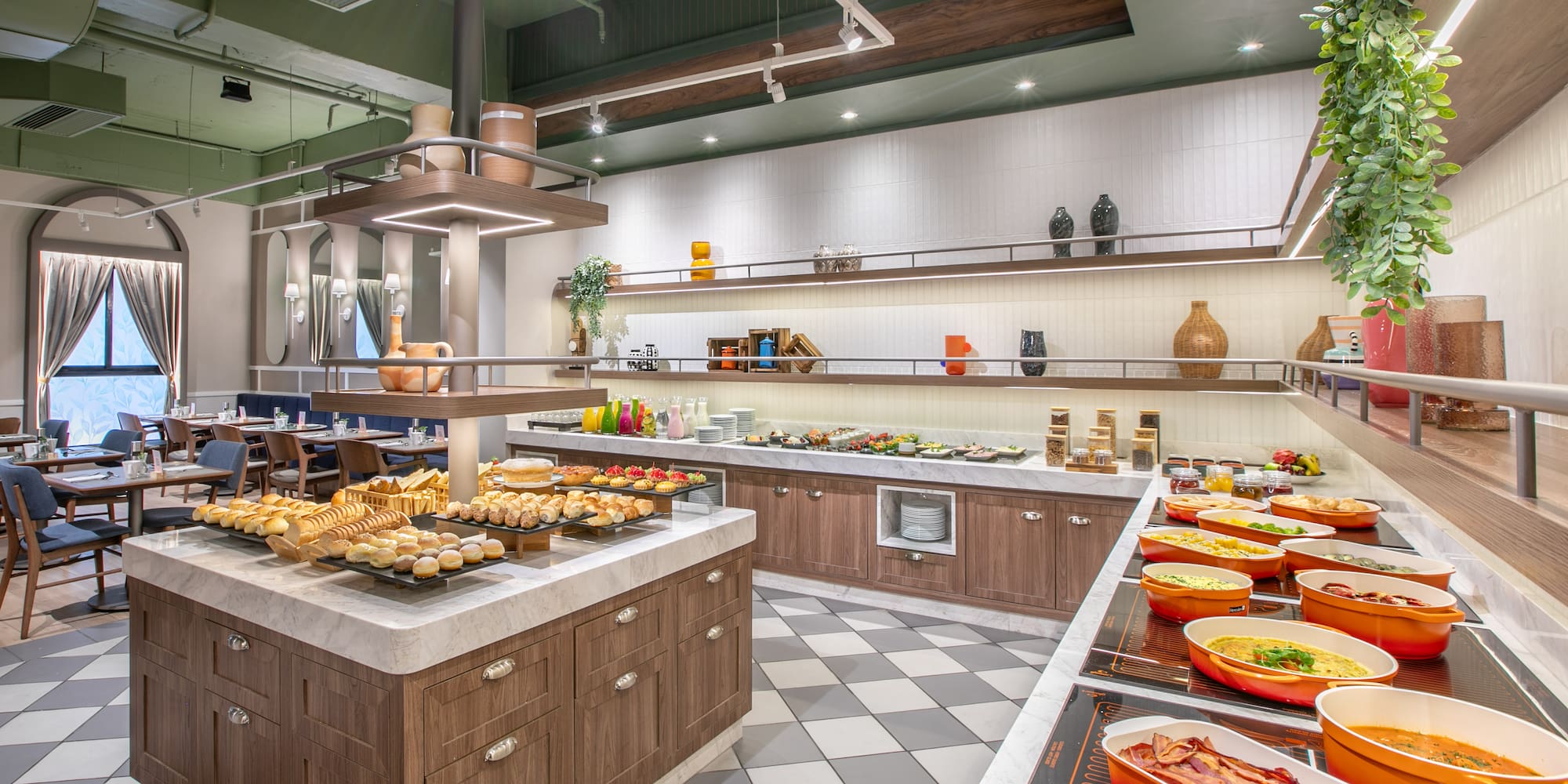 a large kitchen with food on the counter