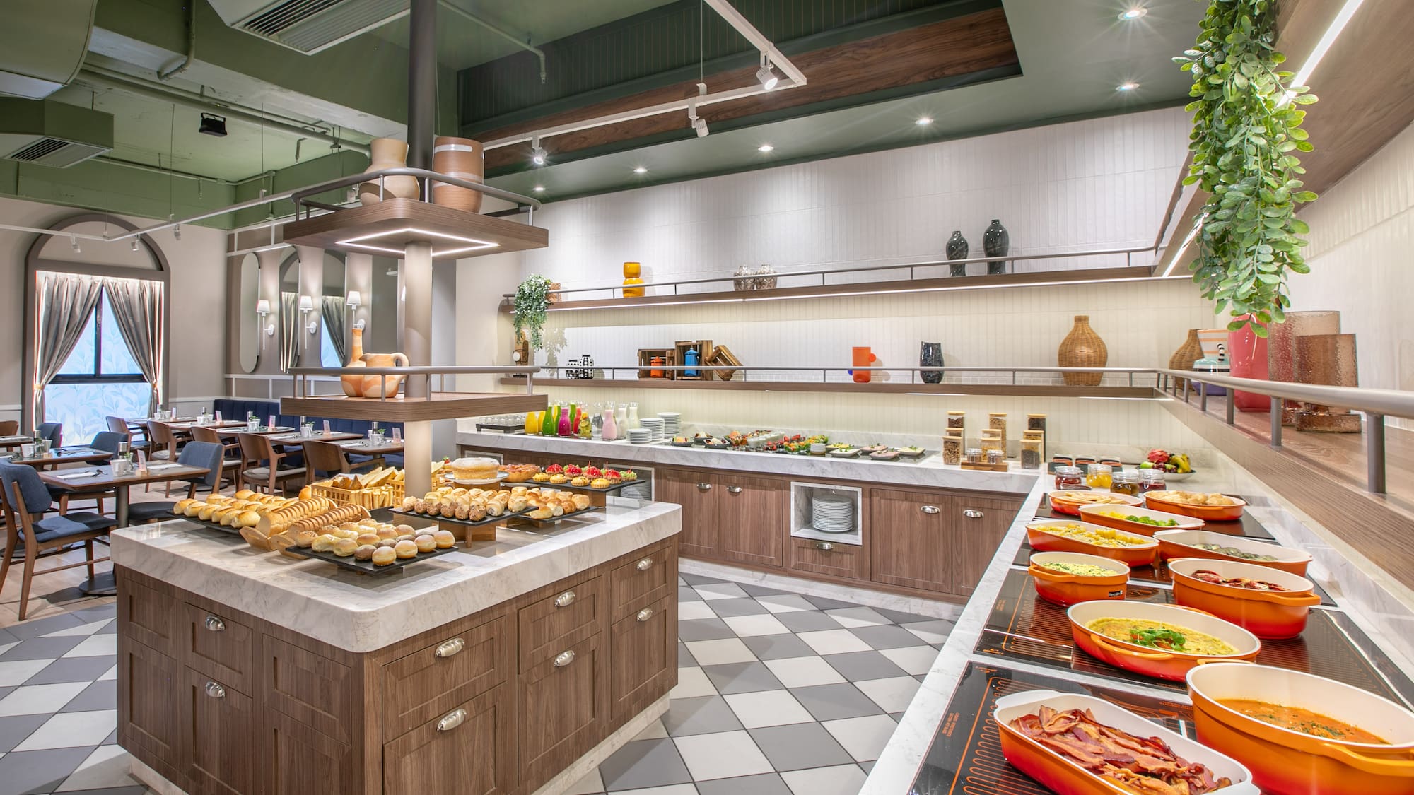 a large kitchen with food on the counter