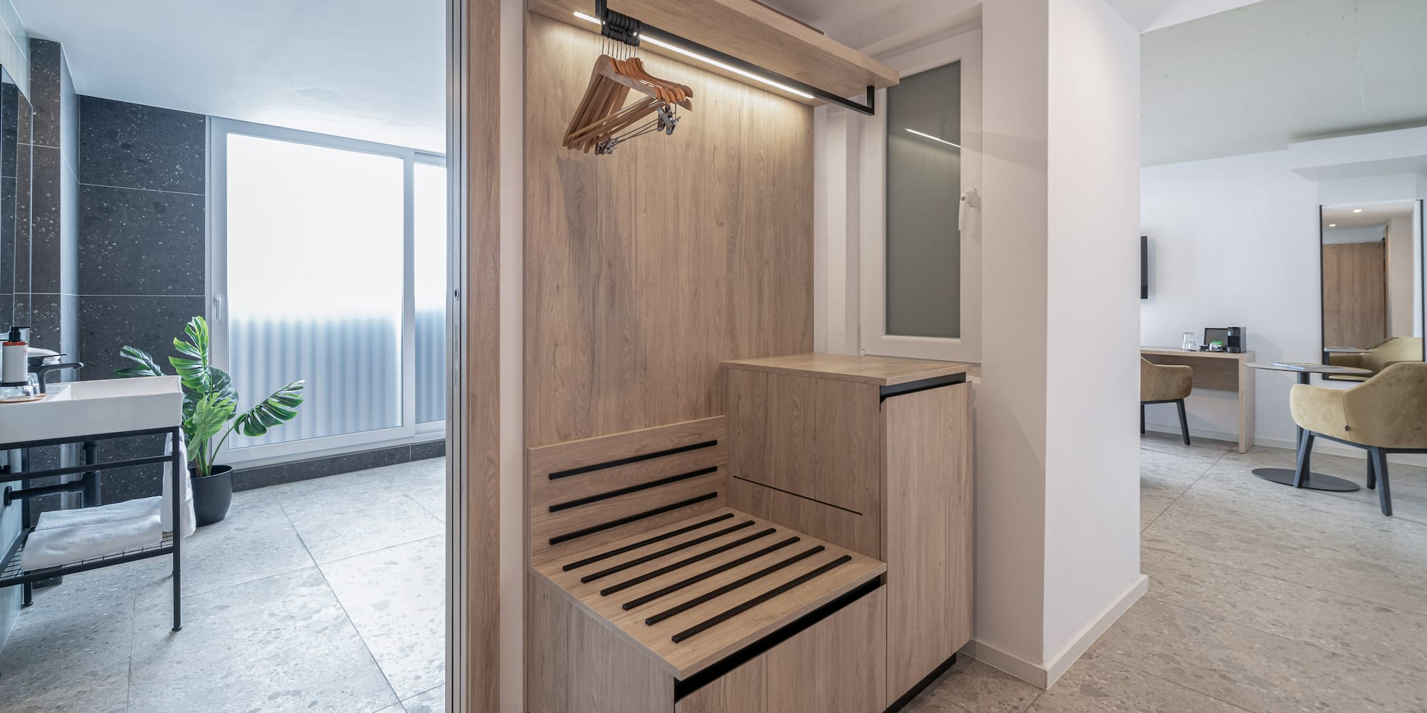 a wooden bench in a hallway