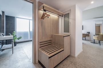 a wooden bench in a hallway