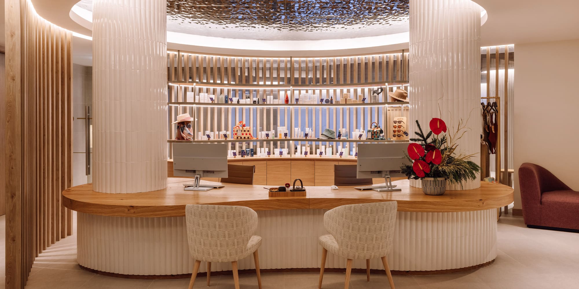 a counter with chairs in front of it