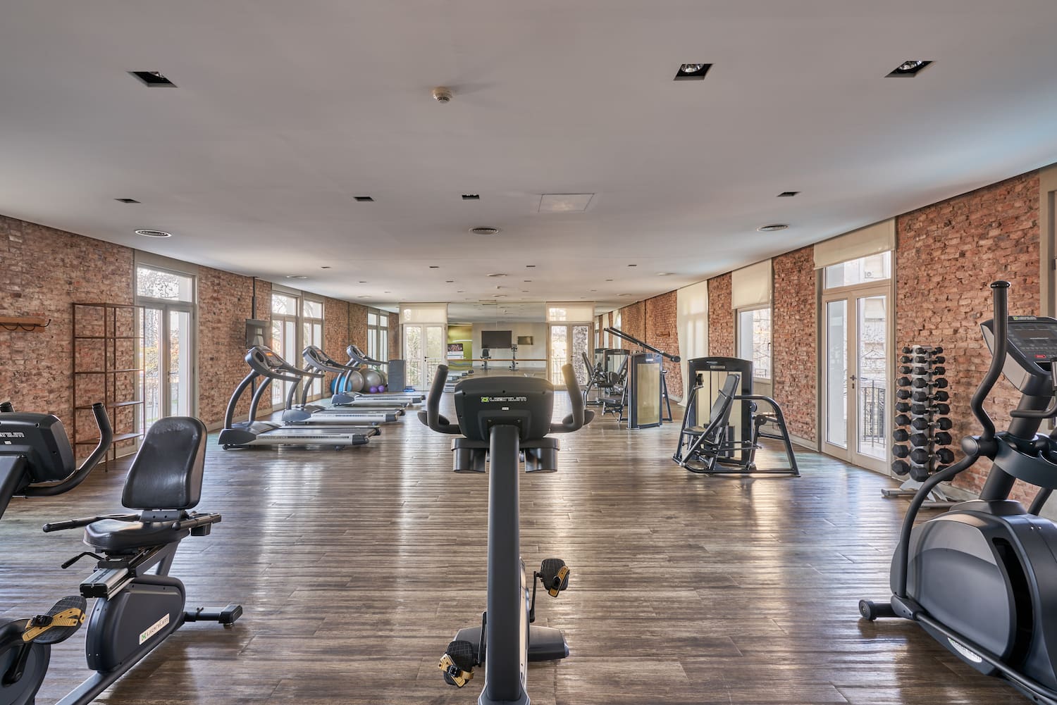 a large room with exercise equipment