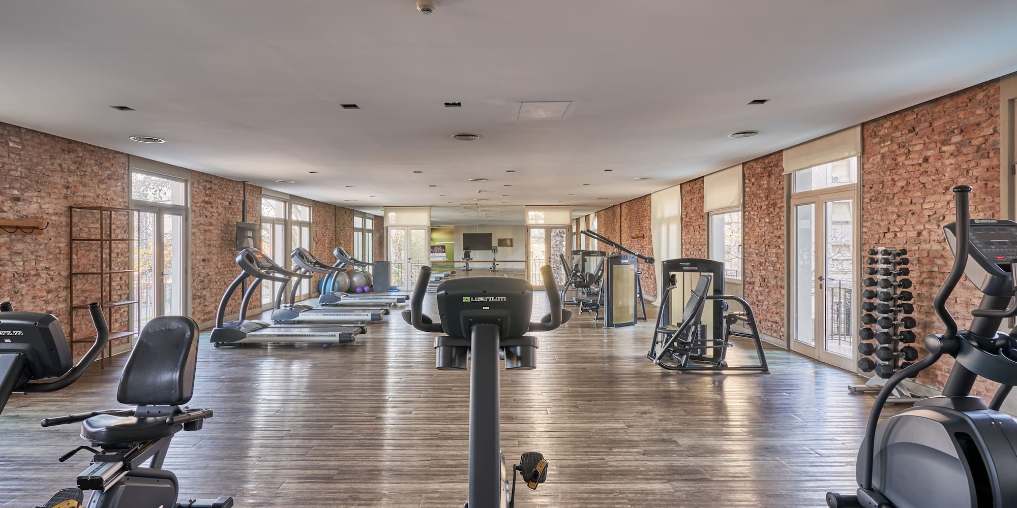 a large room with exercise equipment