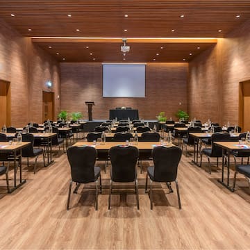 a room with tables and chairs