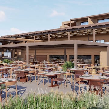 a large outdoor restaurant with tables and chairs