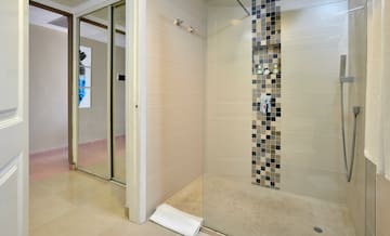 a shower with a glass door