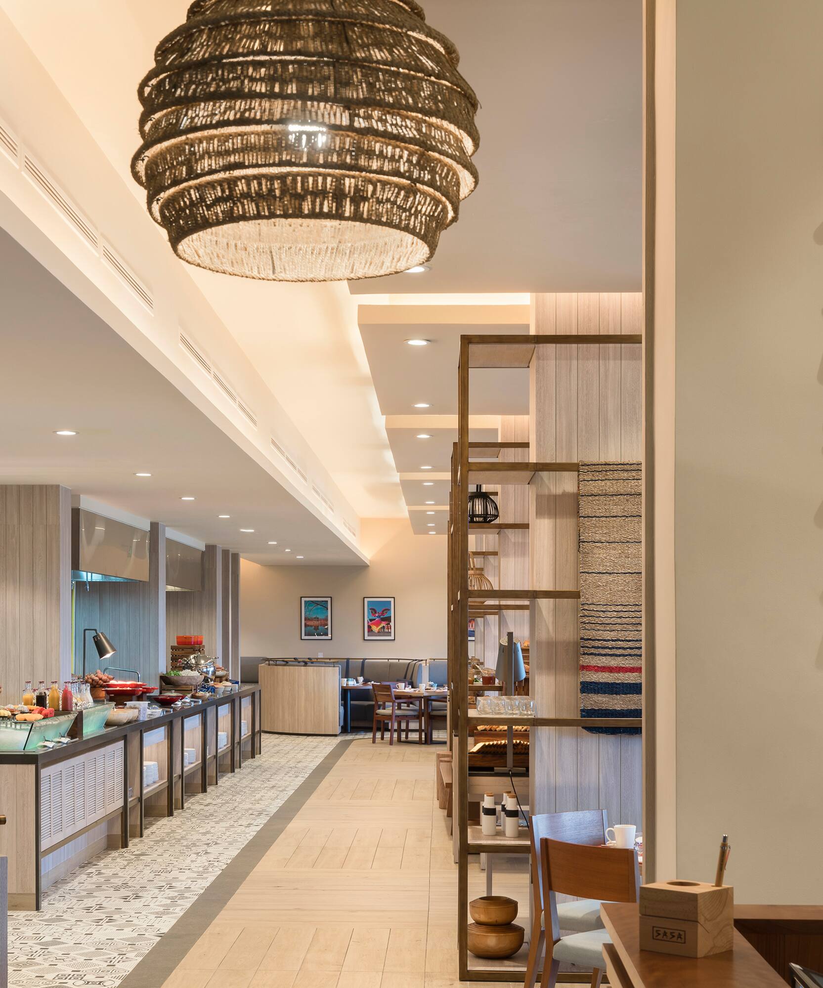 a restaurant with a large chandelier