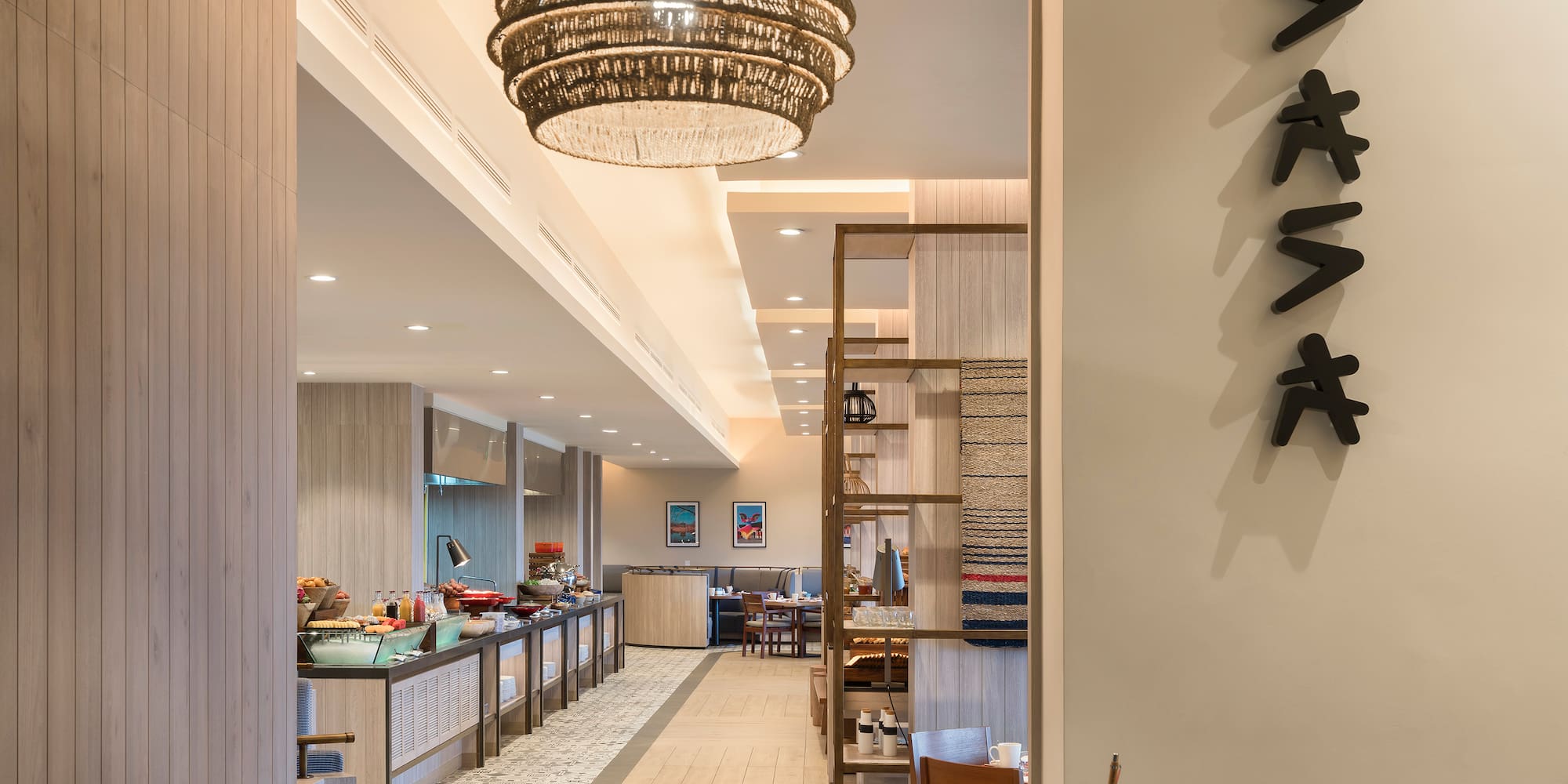 a restaurant with a large chandelier