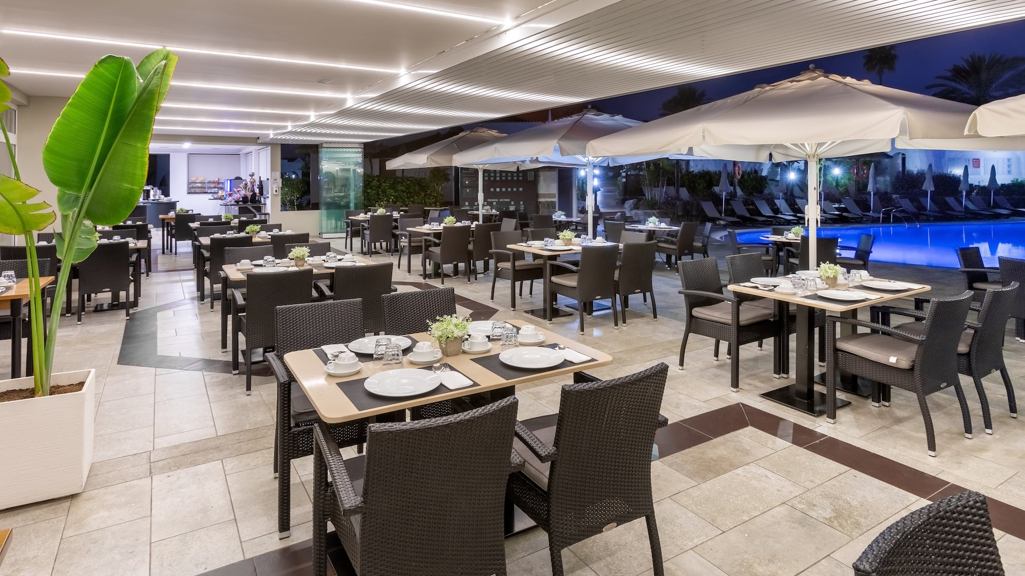 a restaurant with tables and chairs