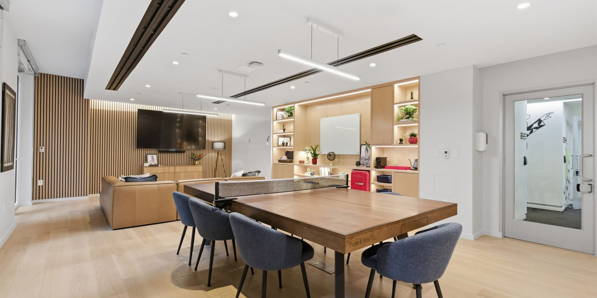 a room with a table and chairs