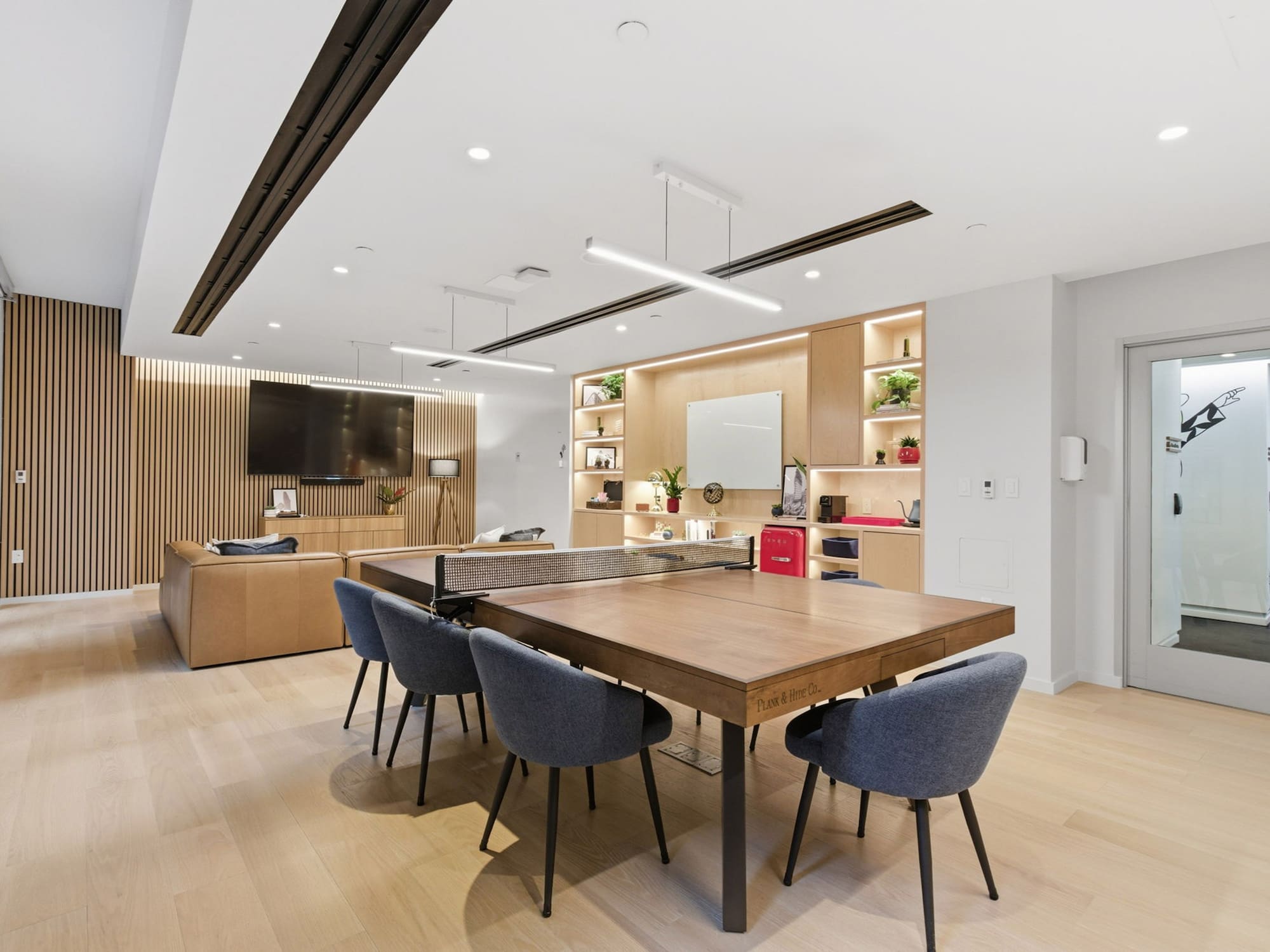 a room with a table and chairs