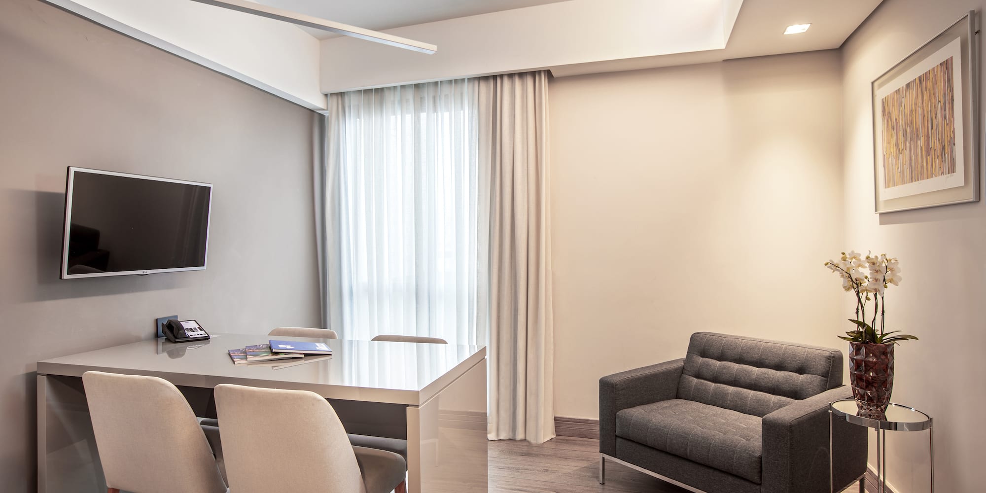 a room with a table and chairs