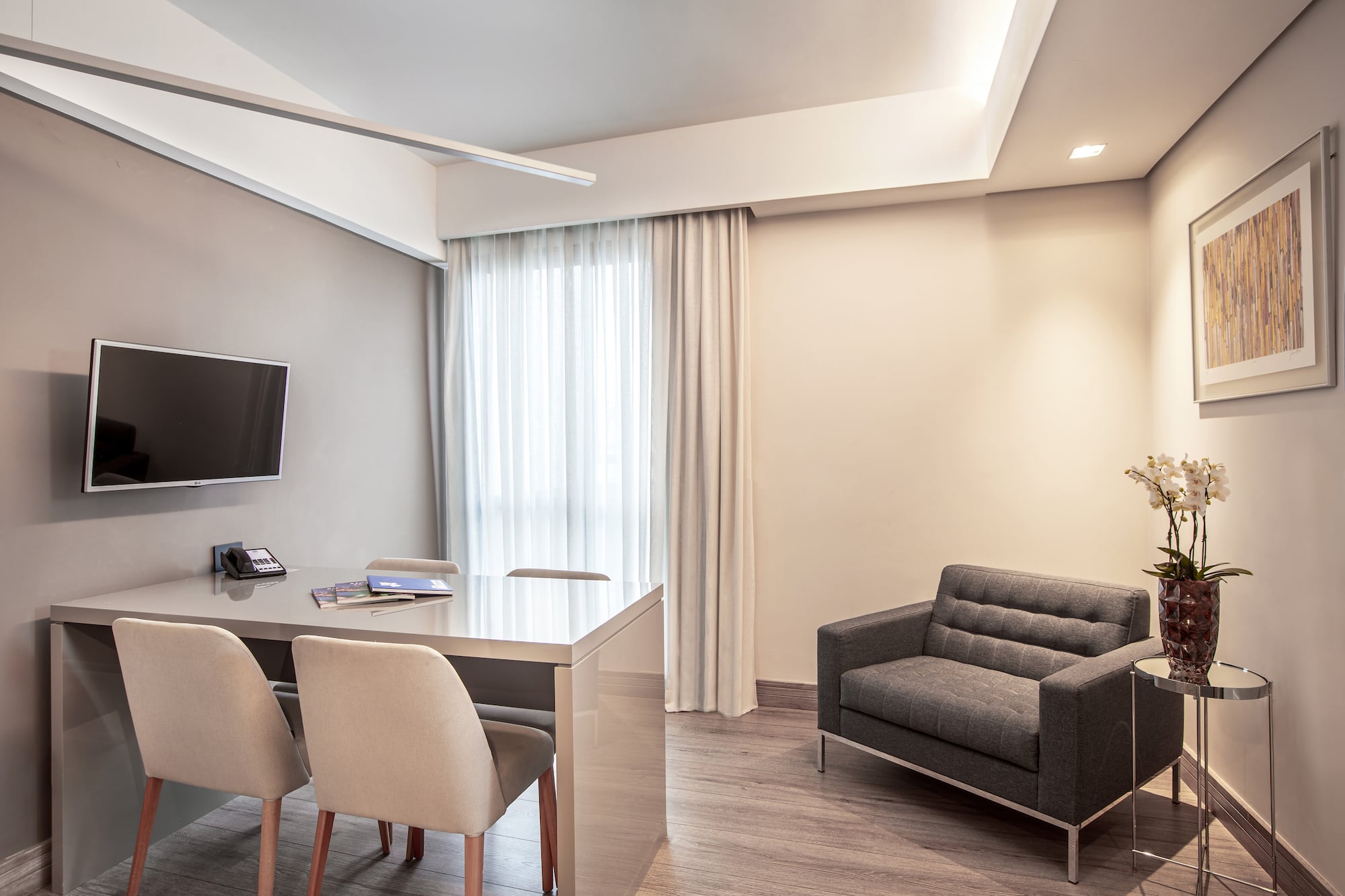 a room with a table and chairs