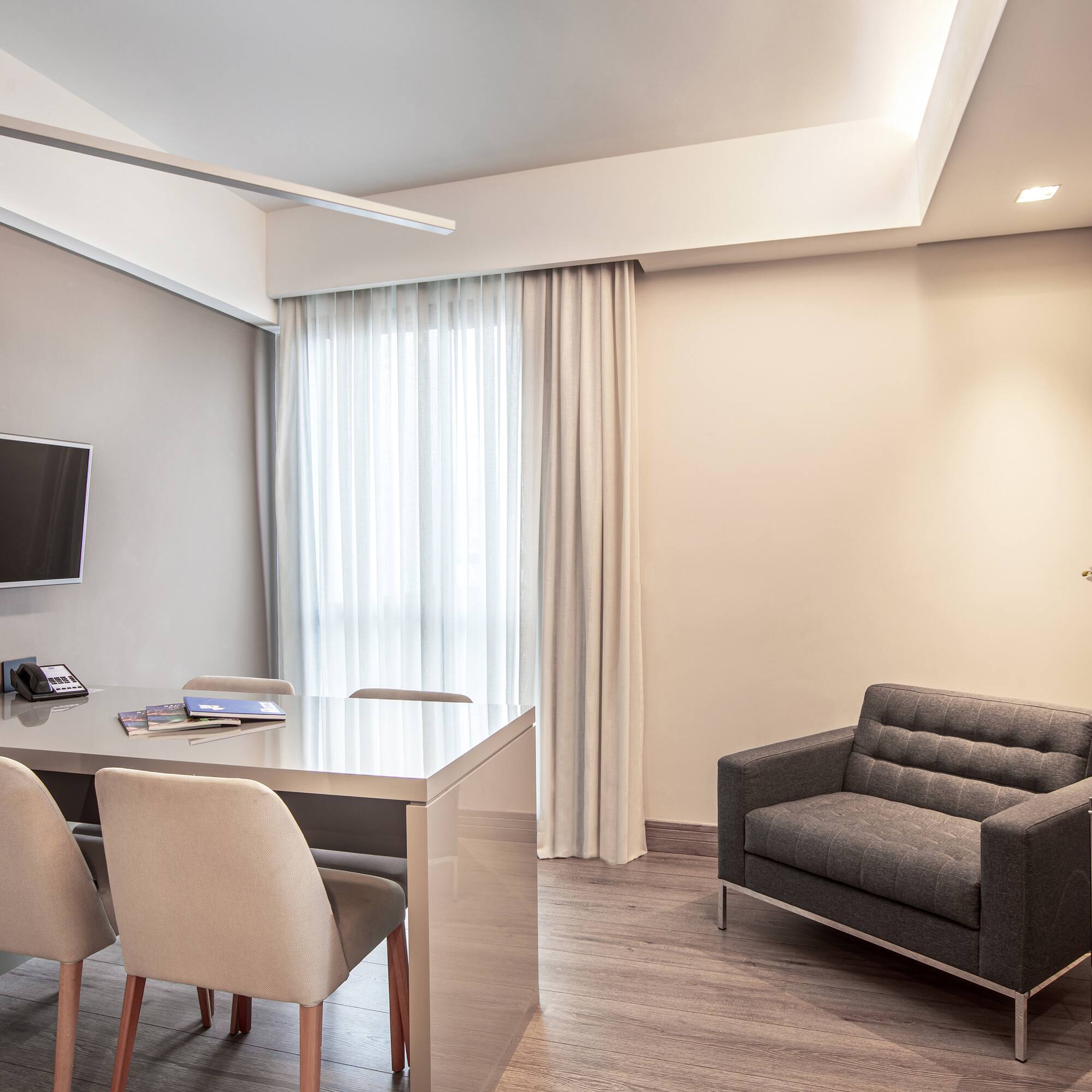 a room with a table and chairs