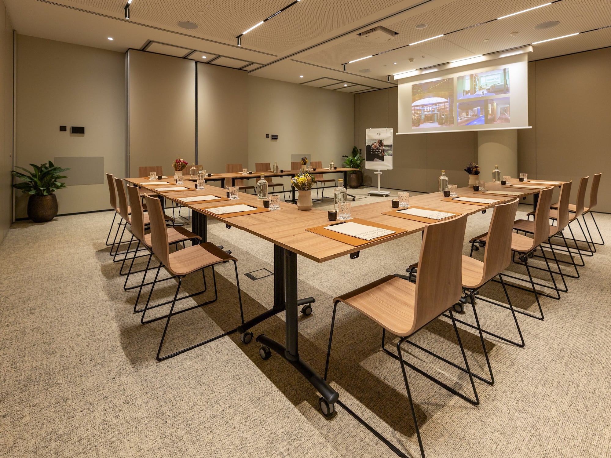 a conference room with a table and chairs