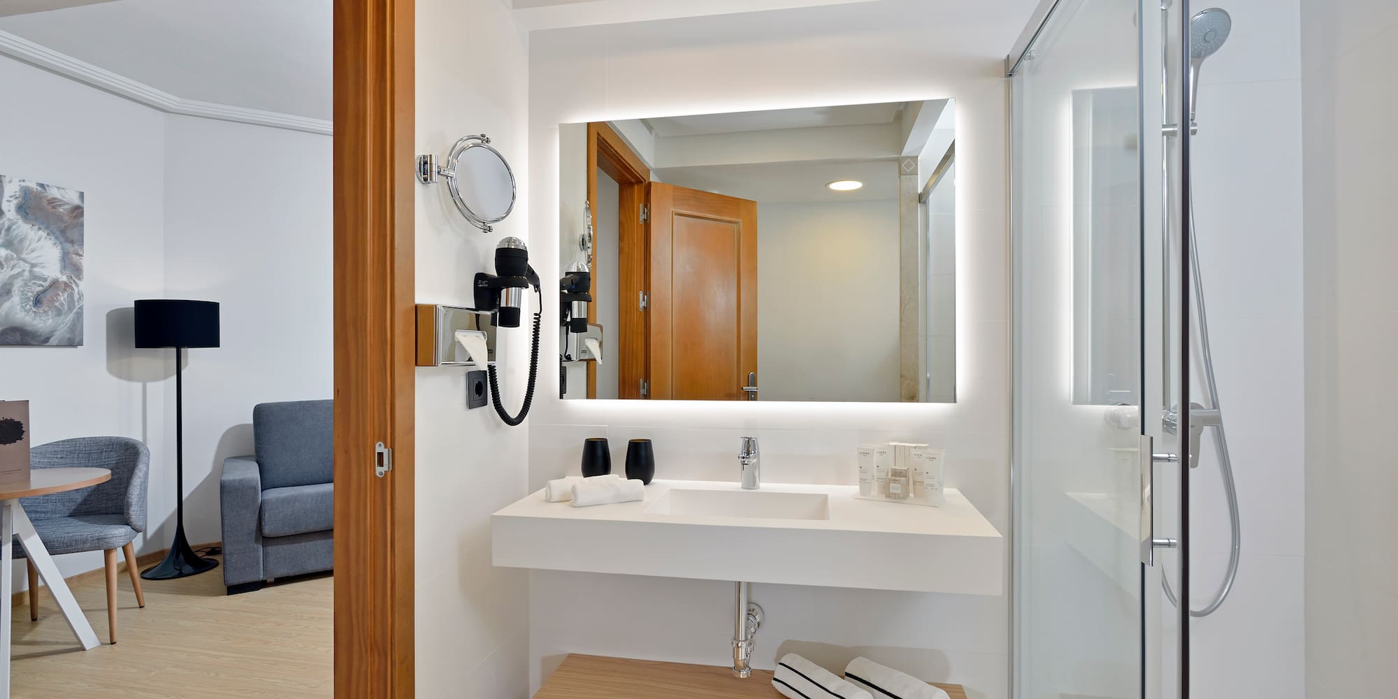 a bathroom with a mirror and a sink