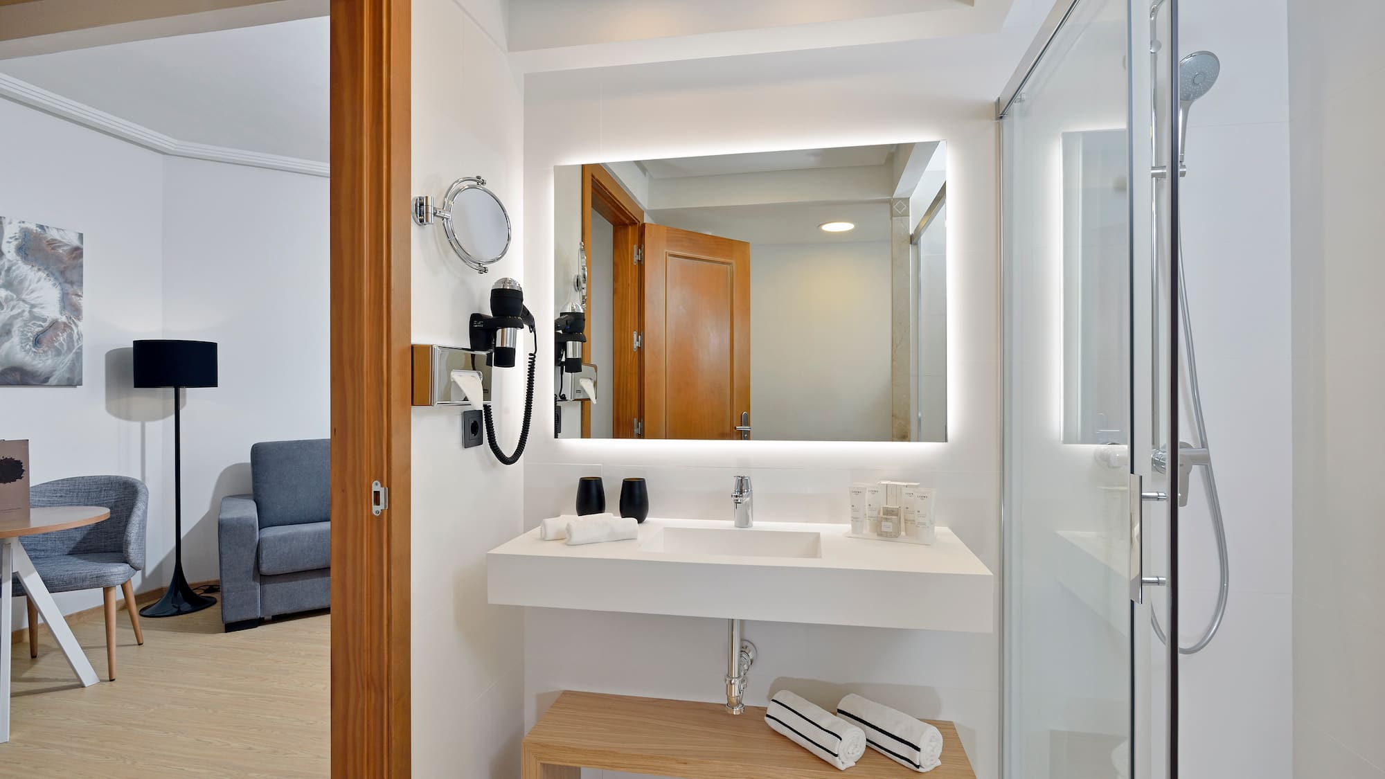 a bathroom with a mirror and a sink