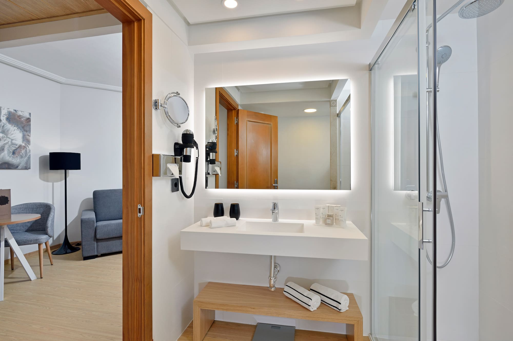 a bathroom with a mirror and a sink