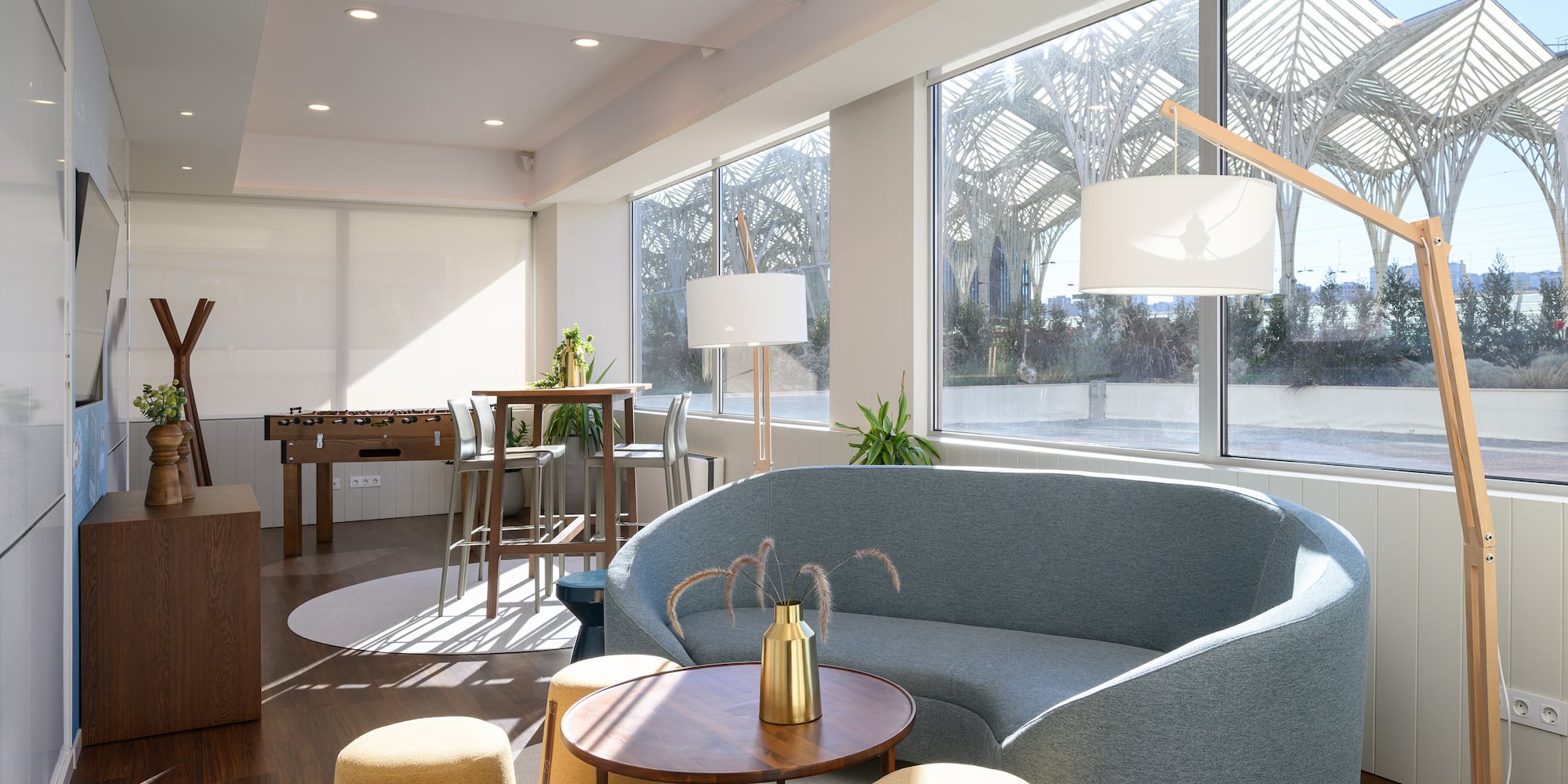 a room with a couch and tables