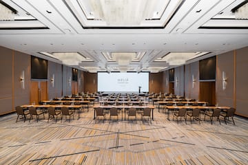 a room with tables and chairs