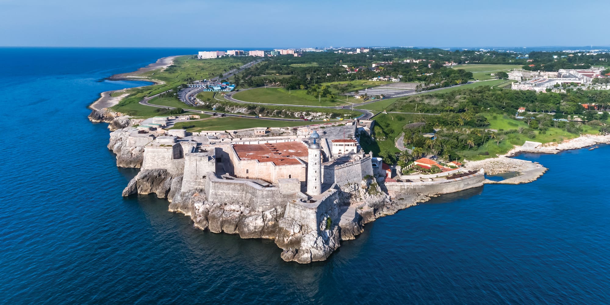 an island with a castle and a body of water