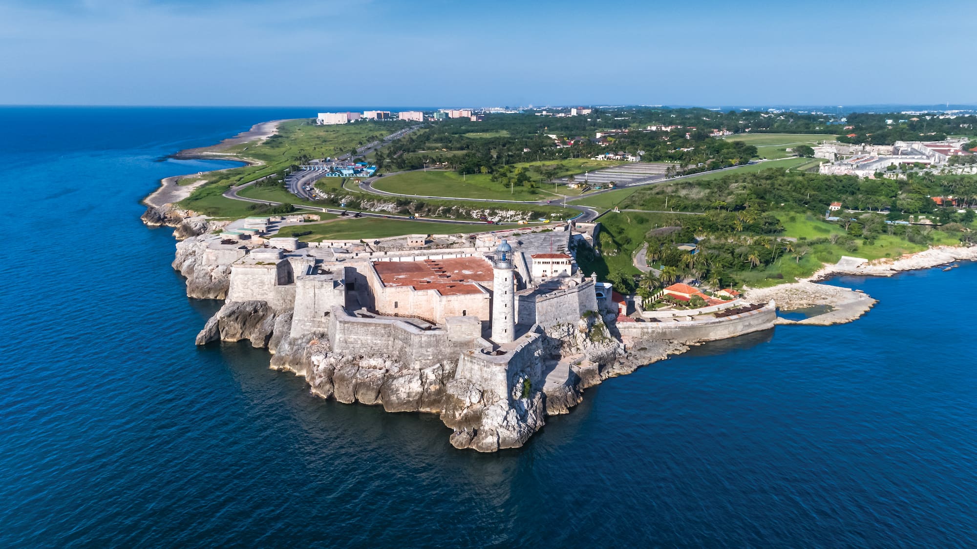 an island with a castle and a body of water