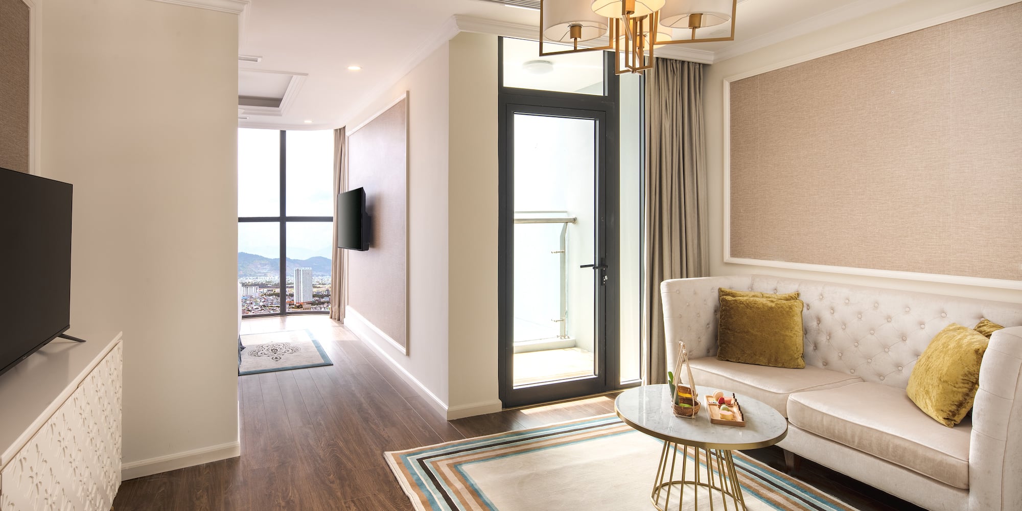 a living room with a couch and a rug